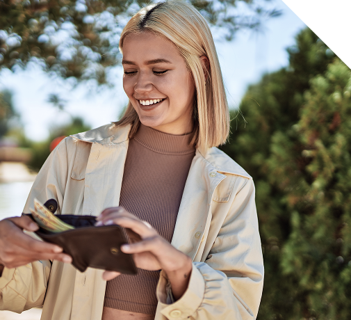 Woman with wallet outdoors